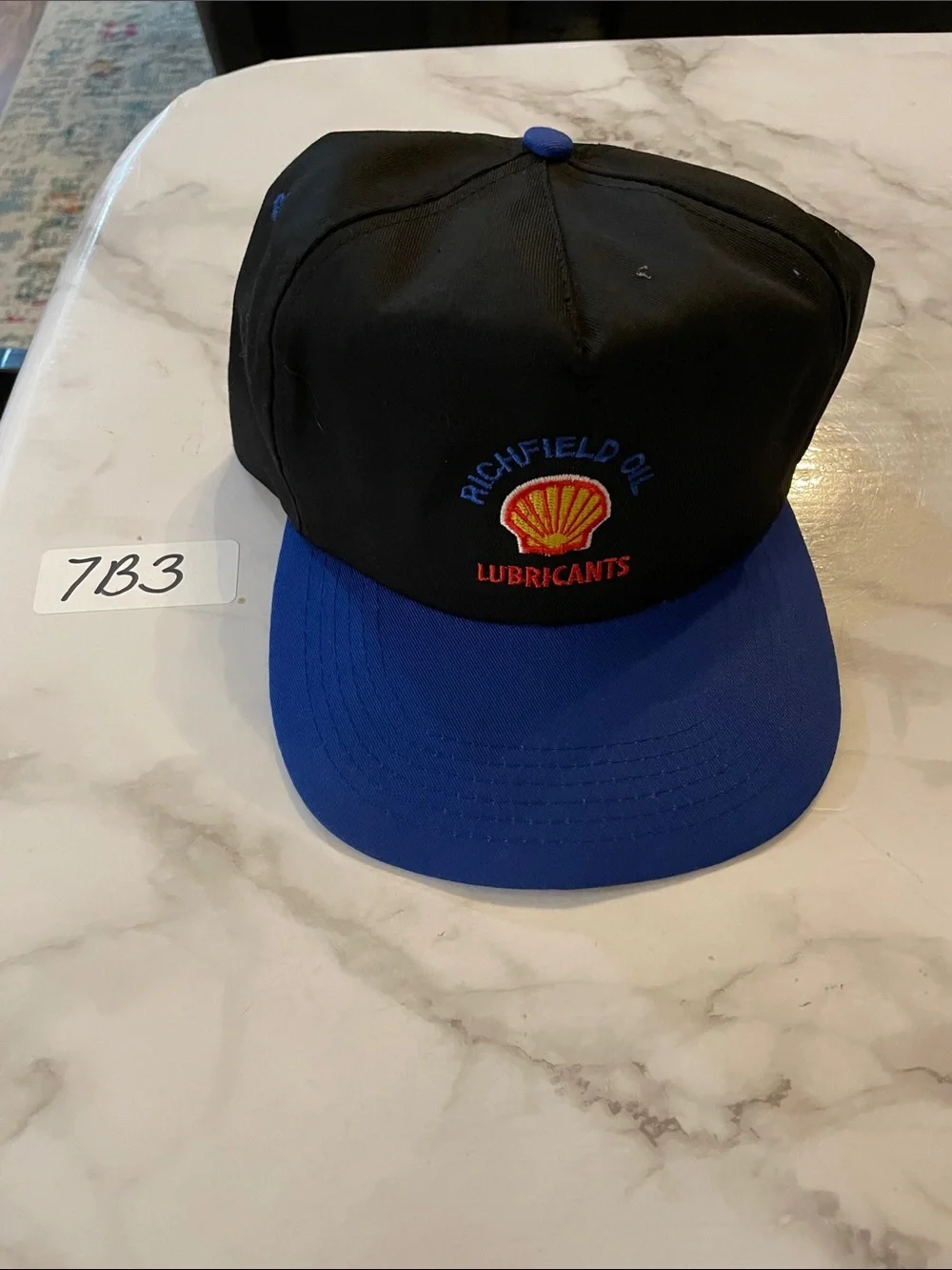 cameo Black Snapback Hat with Blue Brim and Green Underside